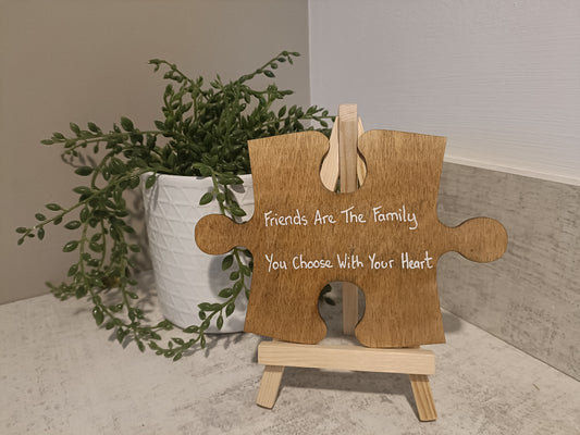 Friends are the family you choose with your heart. Jigsaw piece with display easel