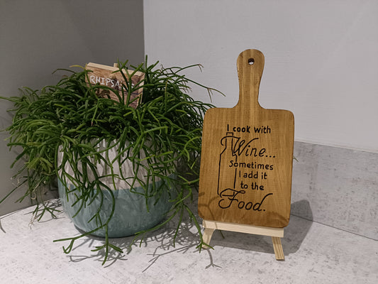 I cook with wine, sometimes I add it to the food. Decorative board with display easel